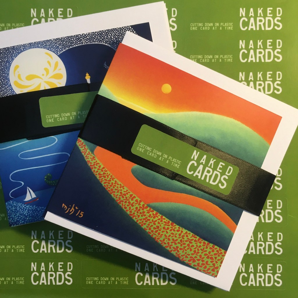 Image features 2 packs of my small greeting cards displayed over a sheet of ‘naked cards’ stickers which I use to secure an envelop to each card as a way to display cards without plastic as I minimise single use packaging where possible.